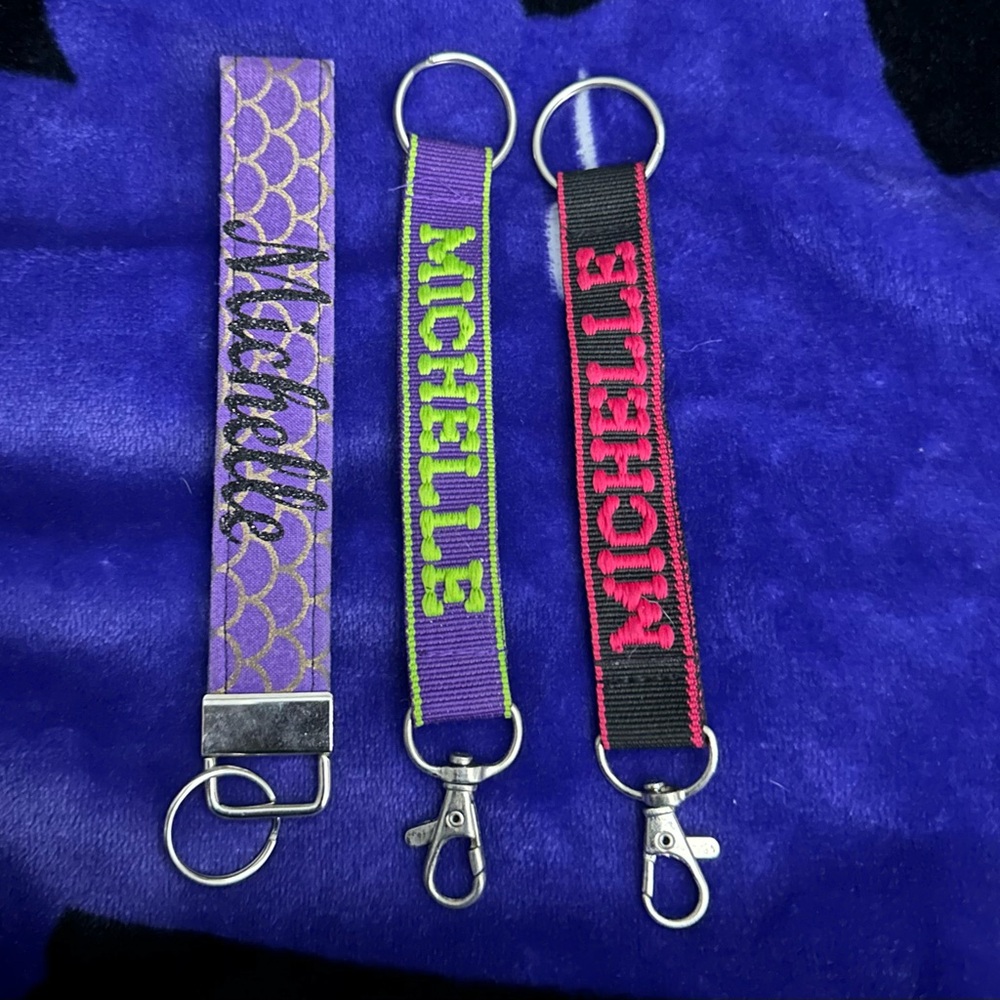 Personalized Keychain Set with Purple, Green, and Black Designs